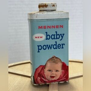 Vintage Mennen baby powder tin. Slight rusting.